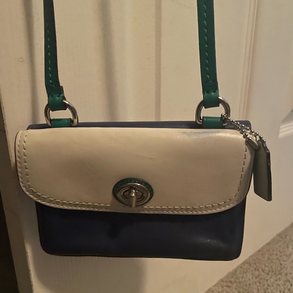 Small Coach wristlet with shoulder strap